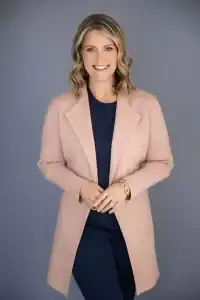 Portrait of Natalie Downey, owner of All In Sanitation Services in Southern California.